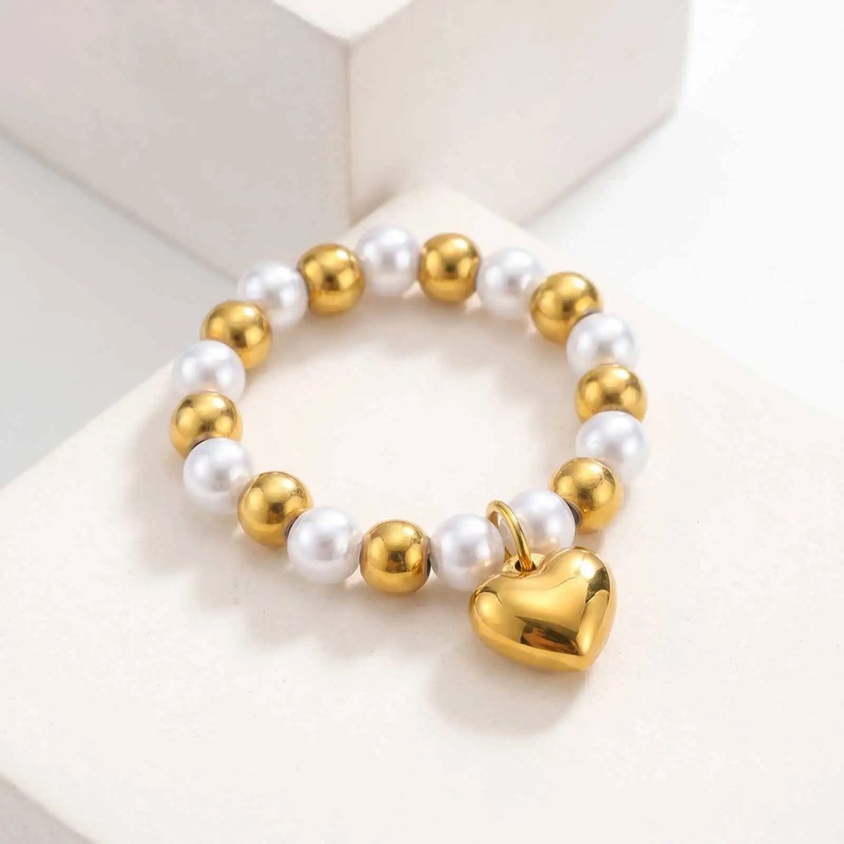 Two-Tone Pearl Heart Charm Ring – 18K Gold Elastic Band Fashion Ring SPOT